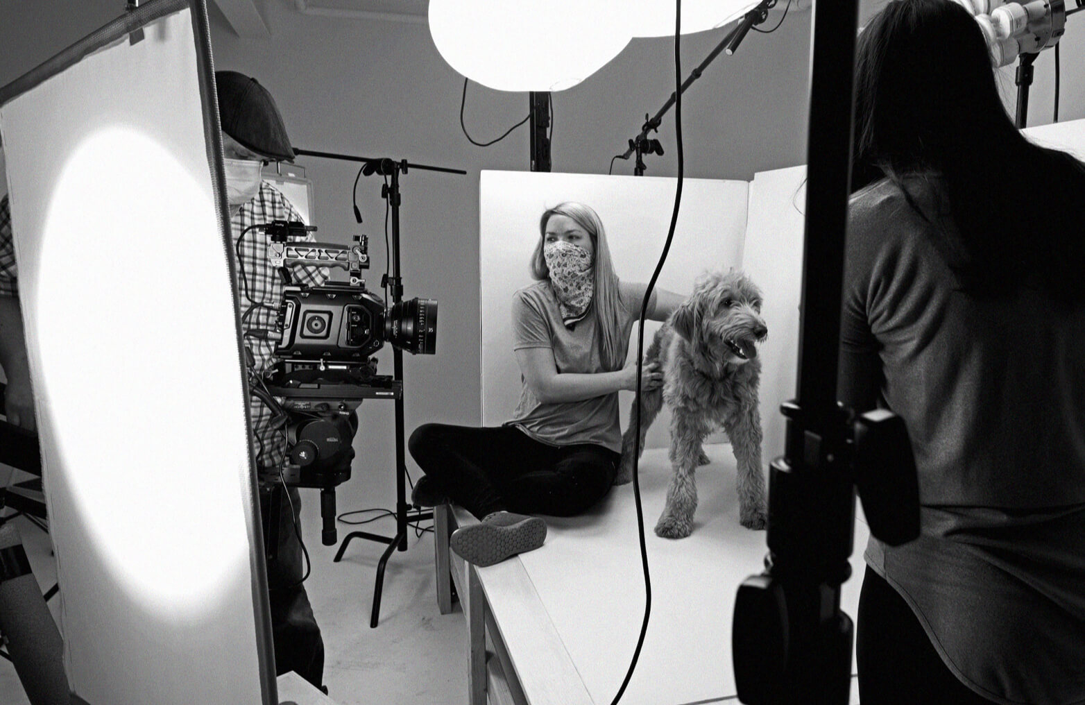 Crystal keeping the dog happy during a shoot- motion and video bts