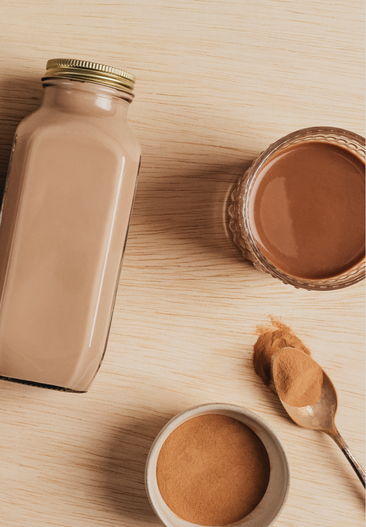 food_and_beverage_branded_ingredients_EverGrain_cpg_companies_milk_bottle_with_powder_and_peanut_butter_food_photography